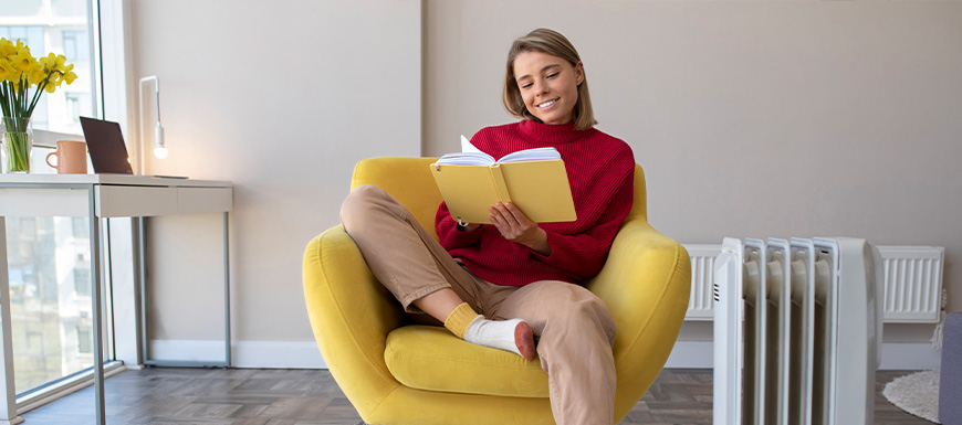 woman reading in comfortable living room